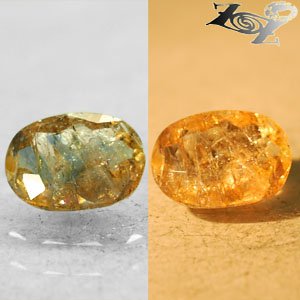 Natural Oval 7*9.5 mm. Salmon Brown Blue Color Shift Magnesio Axinite 1.84 Ct.