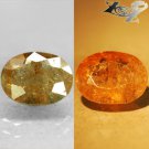 3.98 Ct.Natural Oval 9*11.5 mm. Color Shift Salmon Brown Blue Magnesio Axinite