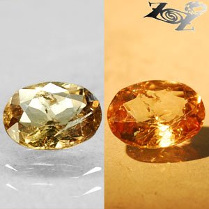 2.51 Ct.Natural Oval 8*10 mm. Color Shift Intense Yellow France Ferro Axinite