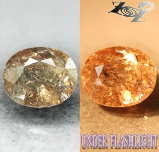 7.13 CT.Firely Natural Oval 11*13 mm. Intense Salmon Yellow Color Shift Axinite