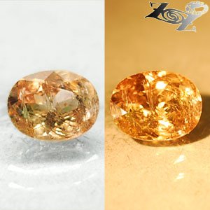 4.06 CT.Natural Oval 8.5*11 mm. Color Shift Lilac Yellow Green Epidot Axinite