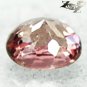 VVS 1 Full Fire Natural Oval 4*5 mm. Intense Padparadscha Malaya Garnet 0.64 CT.