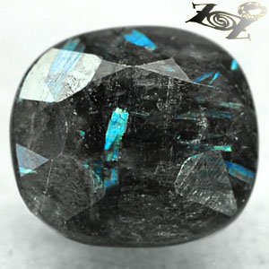 4.38 CT.Natural Oval 9*10 mm. Titanium Blue Schiller Streaks Jenakite Nuummite