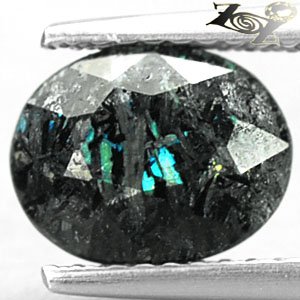 2.32 CT.Natural Oval 7*9 mm. Green Blue Schiller Streaks Mauritania Jenakite Gem
