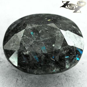 4.64 CT.Natural Oval 10*12 mm. Titanium Blue Schiller Streaks Jenakite Nuummite
