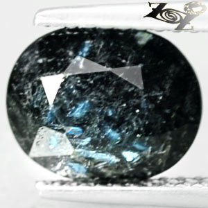 2.96 CT.Natural Oval 8*10 mm. Titanium Blue Sciller Streaks Nuummite Jenakite