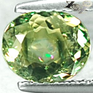 Unusual Natural Oval 6*7m Rainbow Spark Circle Blue Mohrenkopf Tourmaline 0.92CT