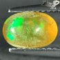 VVS 1 Natural Oval 5.5*8.5 mm. Play Red Green Color Yellow Crystal Opal 1.03 Ct.
