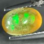 VVS 1 Natural Oval 5.5*8.5 mm. Play Red Green Color Yellow Crystal Opal 1.03 Ct.