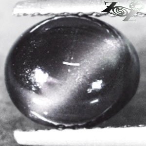 Natural Oval 7*8 mm. Strong Cat's Eye Tanzania Intense Purple Scapolite 1.84 CT.