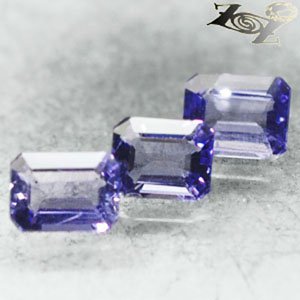 VVS 2 Natural Emerald 4*5 mm. 3 Pcs Intense Purple Mozambique Scapolite 0.32 CT.