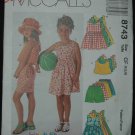 McCall's 8743 SEWING PATTERN FOR CHILDREN'S DRESS ROMPERS, TOP AND PULL-ON SHORTS