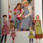 SIMPLICITY 3949 SEWING PATTERN FOR  MISSES' & CHILDS' APRONS
