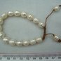 BR429-90105G     Short Rice Bracelet White with Brown Threads