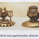 Tortolani devil and angel shoulder pins