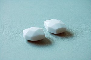 White faceted glass beads (per pair)