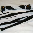 20 Lash 1/2 Inch Wide Black  and White Suede Flogger