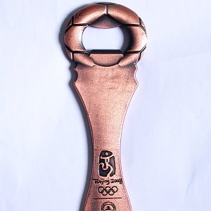 BEIJING 2008 OLYMPICS SPONSOR TSINGTAO BEER COPPER BOTTLE OPENER