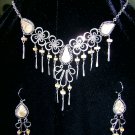 Silver and precious stone necklace