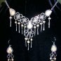 Silver and precious stone necklace