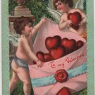 Valentines Day Postcard, Cherubs Stuffing Hearts into Huge Pink Envelope c.1910