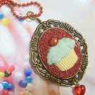 Red Glittery Cupcake Cameo with Cherry on Top