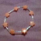 Stretchy Orange Star Bracelet