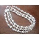 TB371  Three Stranded White Pearls & Genuine Swarovski Moonlite Crystals Bracelet