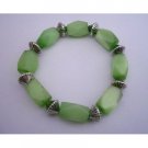 TB295  Green Barrel Cat Eye Stretchable Bracelet w/ Daisy Spacing Beads Bracelet