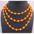 UNE124  Orange Cultured Pearls Long 54 Inches Necklace