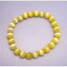 UBR025  Handcrafted Bracelet Yellow Stretchable Bracelet Cat Eye Beaded Bracelet