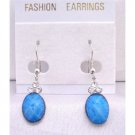 D148Dollar Earrings Turquoise Stone Colored Oval Bead Decorated w/3 Simulated Diamond On The Top