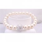 TB863  Bridal Bridemaids Ivory Stretchable Bracelet 7mm Pearls w/Diamante Ball At Center
