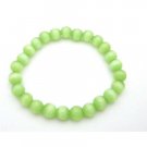 UBR205  Adorable Beautiful Green Under Stretchable Cat Eye Bracelet