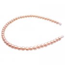 GC260  Flower Girl Hairband In Beautiful Peach Pearls