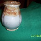 Blue glazed pottery vase with brown contrast