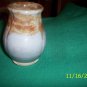 Blue glazed pottery vase with brown contrast