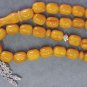 PRAYER BEADS KOMBOLOI ROUND BARREL HONEY AMBER