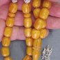 PRAYER BEADS KOMBOLOI ROUND BARREL HONEY AMBER