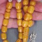 PRAYER BEADS KOMBOLOI ROUND BARREL HONEY AMBER