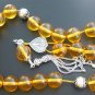 GREEK KOMBOLOI CLEAR HONEY AMBER