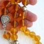 GREEK KOMBOLOI CLEAR HONEY AMBER