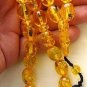 PRAYER BEADS *OVAL* AMBER RESIN INSECTS IN EACH BEAD