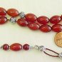 GREEK KOMBOLOI OVAL CARNELIAN AND STERLING WORRY BEADS