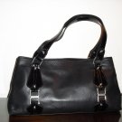 Black leather satchel handbag with patent leather