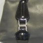 Gray leather with black patent leather details and buckles