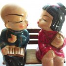Early Vintage Oriental Kissing Boy Girl on Bench Salt Pepper 6318