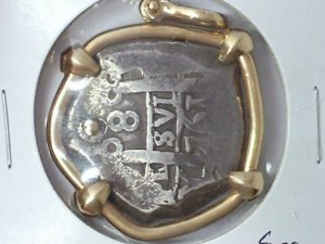 A Sea Salvaged Spanish Colonial Silver Cob In 14k Bezel