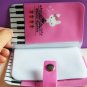 Piano Rabbits CardHolder (12 Pockets)