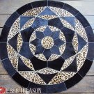 626 COWHIDE HAIR-ON LEATHER PATCHWORK RUG 48IN DIA